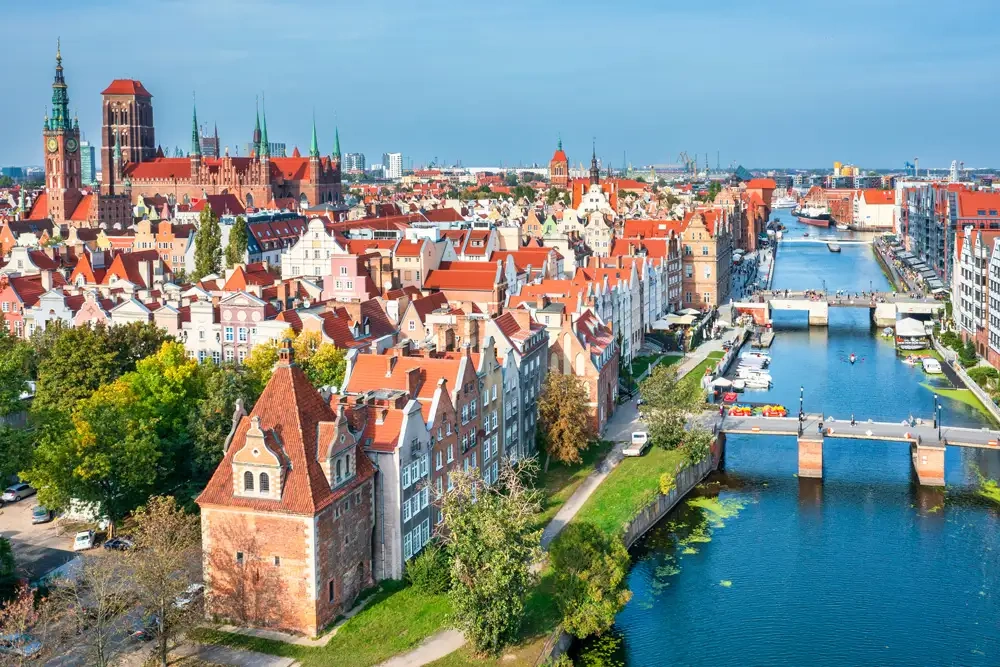 Gdańsk historic waterfront, colourful facades and Motława River in Poland