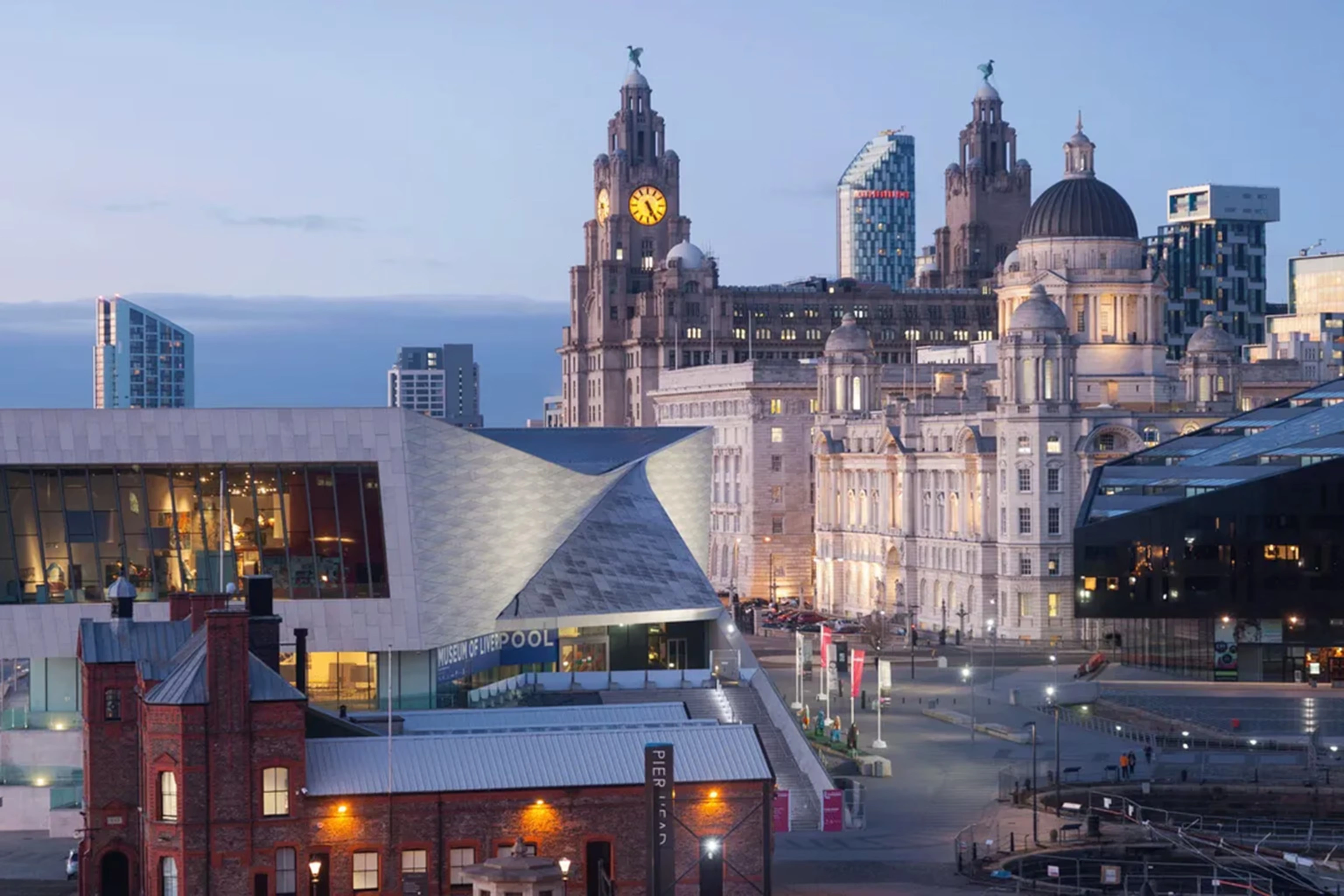 Liverpool waterfront, Three Graces and River Mersey in England
