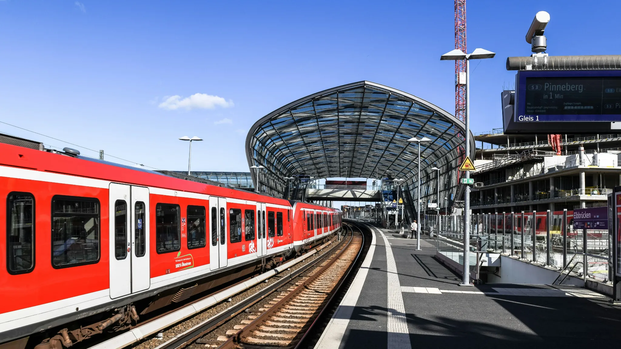 Train journey through a station platform