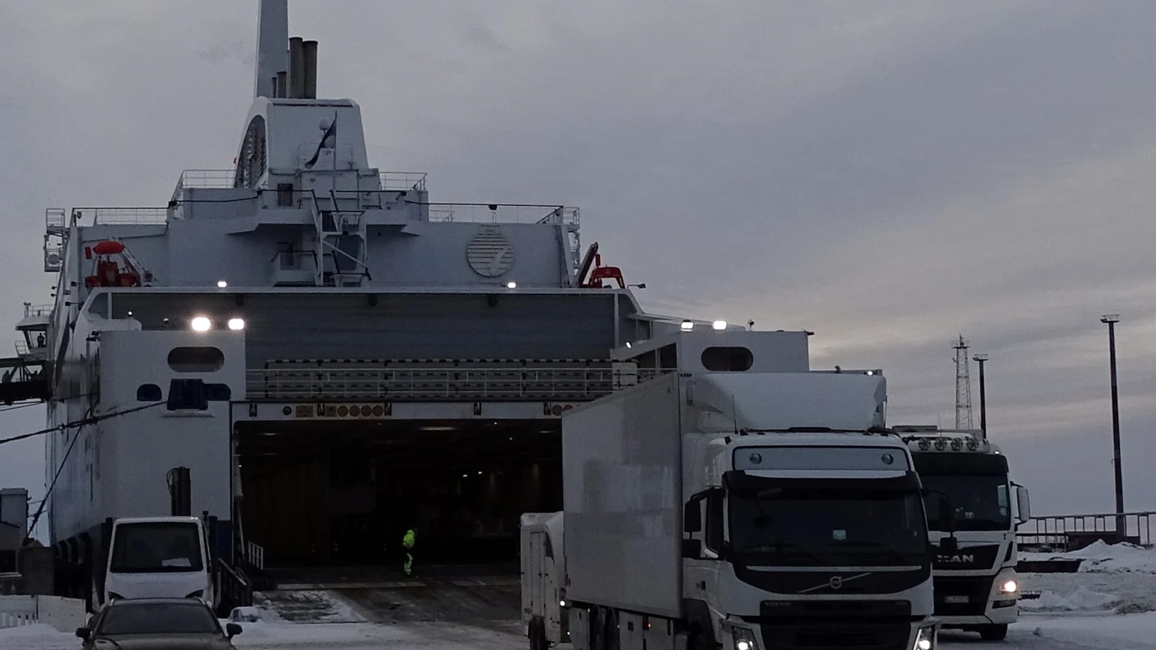 Vehicles unloading from Aurora Botnia in winter
