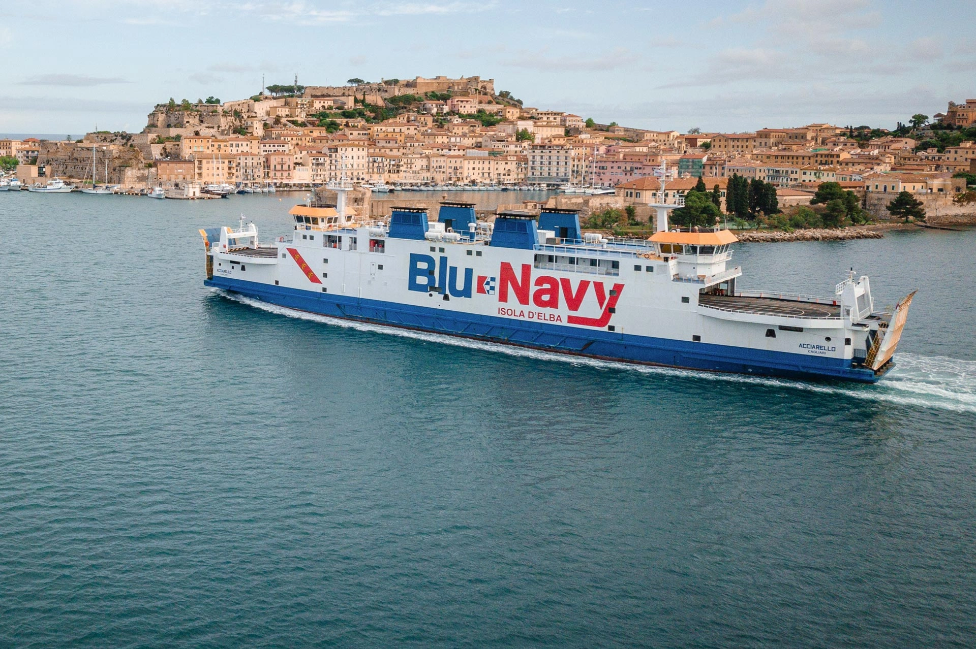 Blu Navy ferry sailing past Portoferraio on Elba